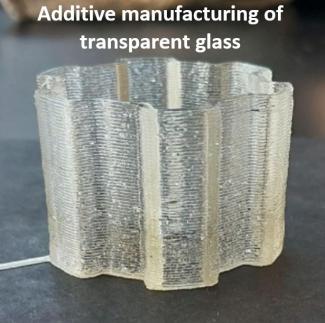 Additive manufacturing of transparent glass objects