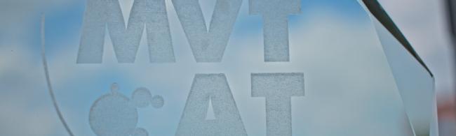 decorative: glass surface engraved with the institute logo