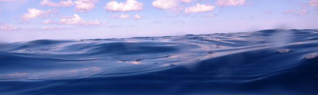 Water surface with clouds