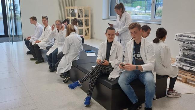 Participants in the School College 2023 prepare for experimentation