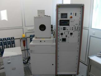 Vapour deposition system with transformer and control cabinet