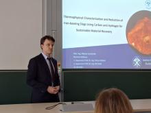 Assoziiertes Mitglied des Graduiertenkollegs GRK2802, Mykyta Levchenko, während seiner Doktorverteidigung