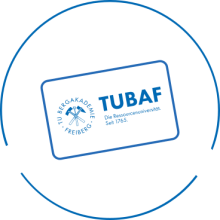 Blaues rundes Icon mit stilisierter Karteikarte und dem Schriftzug 'TUBAF'